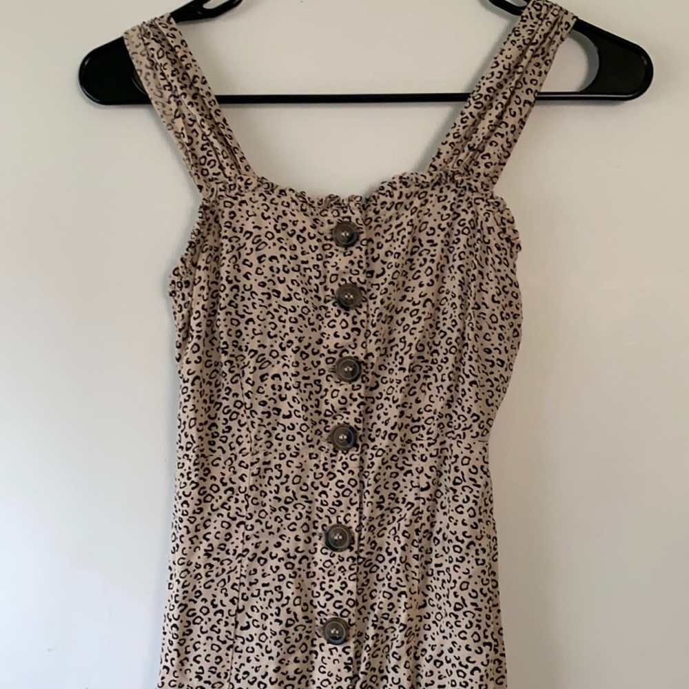 Midi length cheetah print dress.
